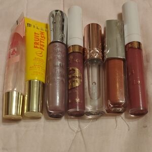 Milani Fruit Fetish Lip Gloss Collection - Clear, Yellow, Purple, Brown Shades